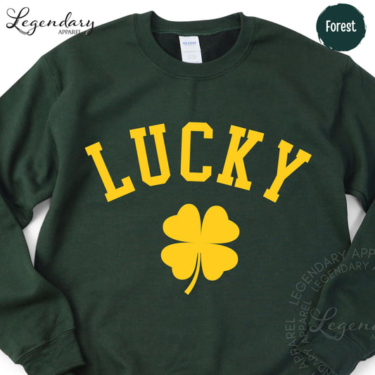 A green sweatshirt with the word "Lucky" printed in large yellow letters, along with a yellow clover symbol.