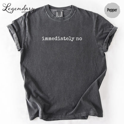 a gray t-shirt with the text "immediately no" printed on it.