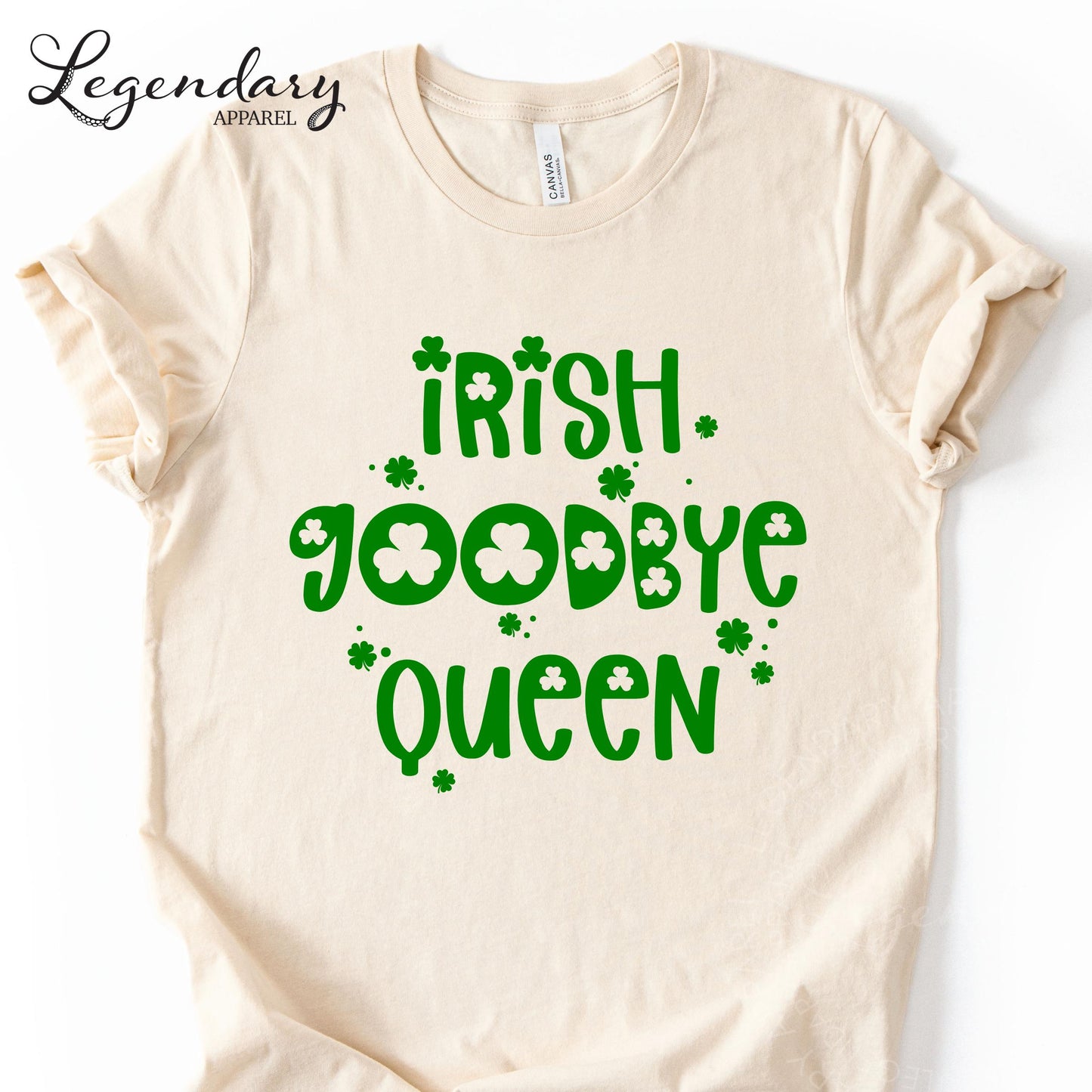 a white t-shirt with a green text design that says "Irish goodbye queen".