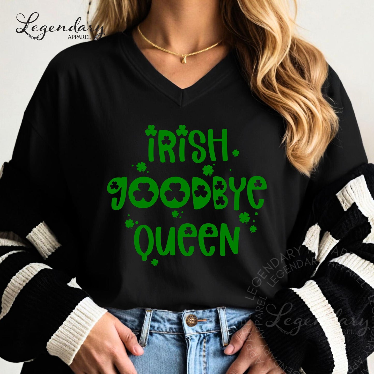 A woman wearing a black shirt with the text "Irish. Goodbye. Queen" printed on it.