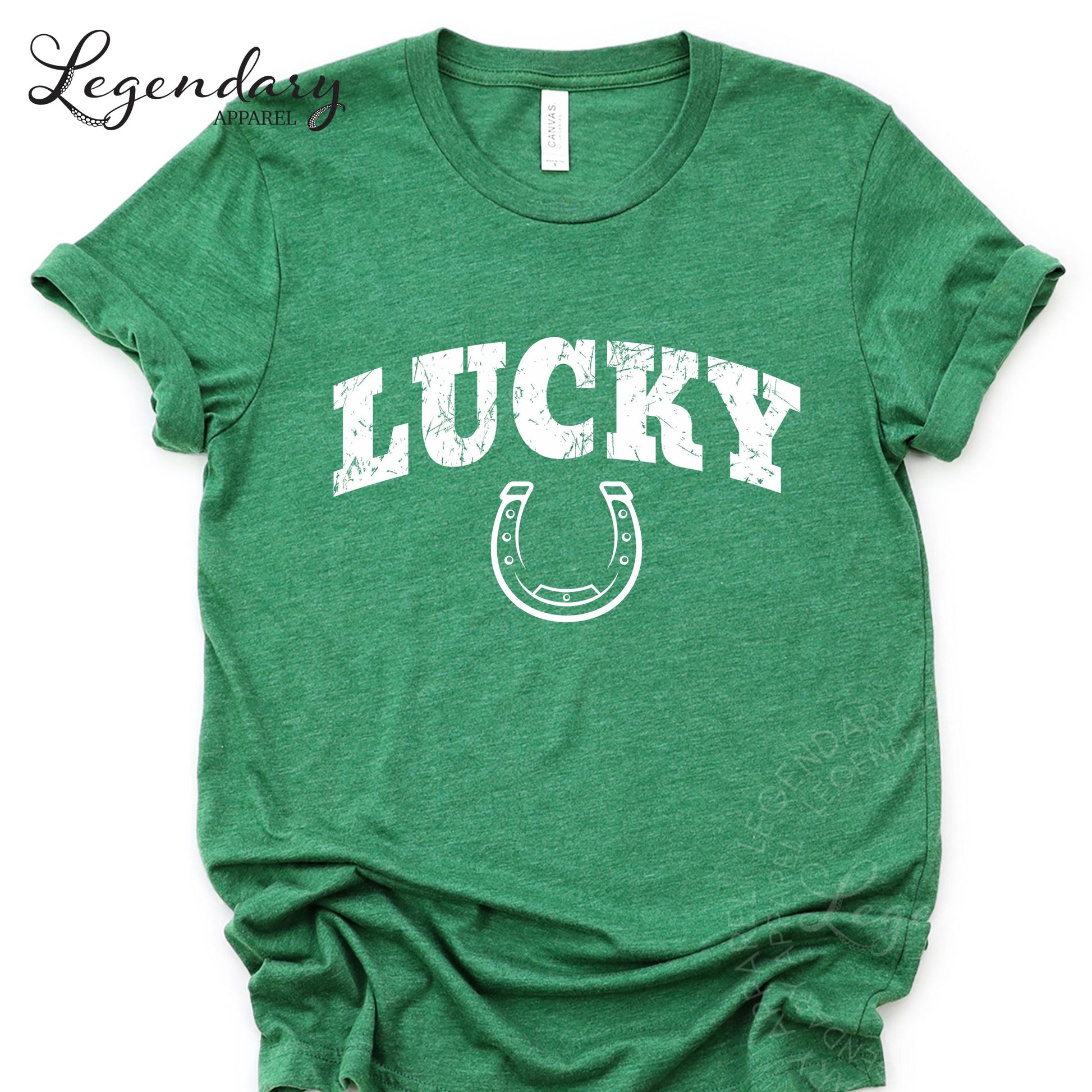 A green t-shirt with the word "Lucky" printed on it, along with a horseshoe symbol.