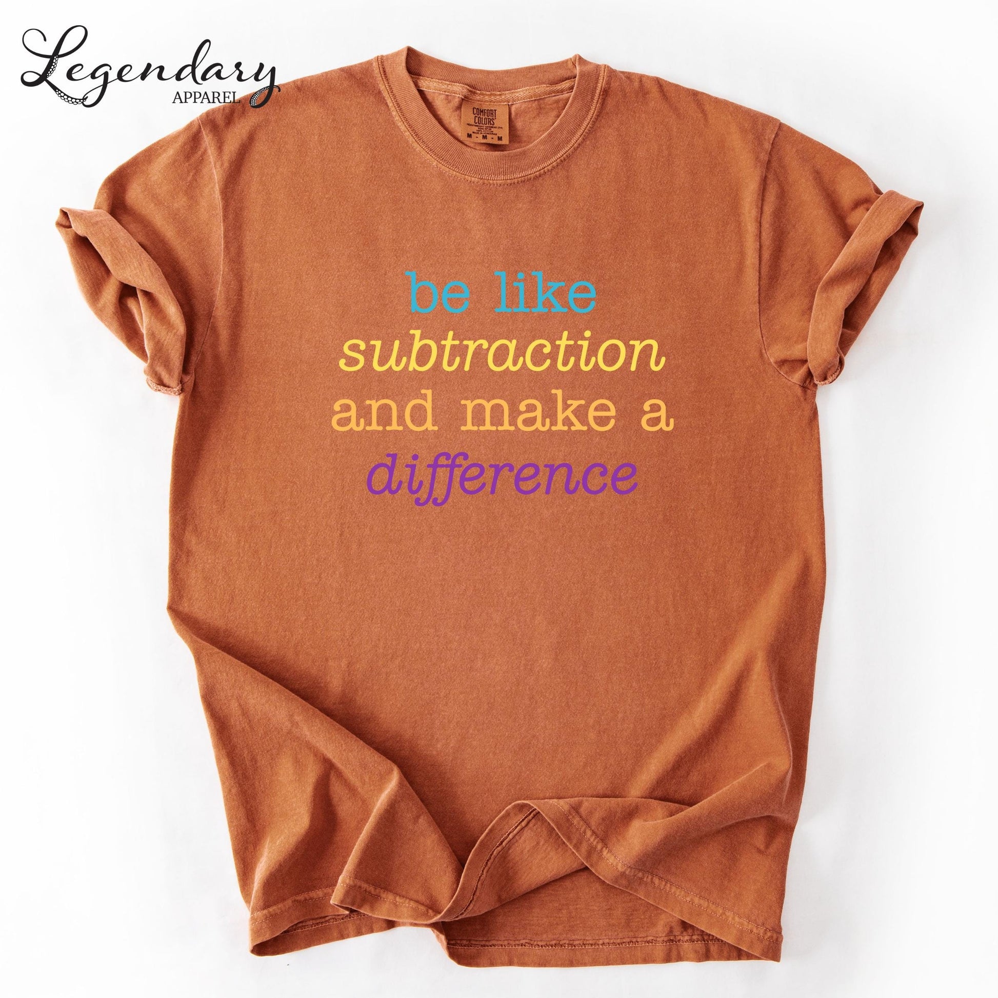a brown t-shirt with a motivational quote printed on it.
