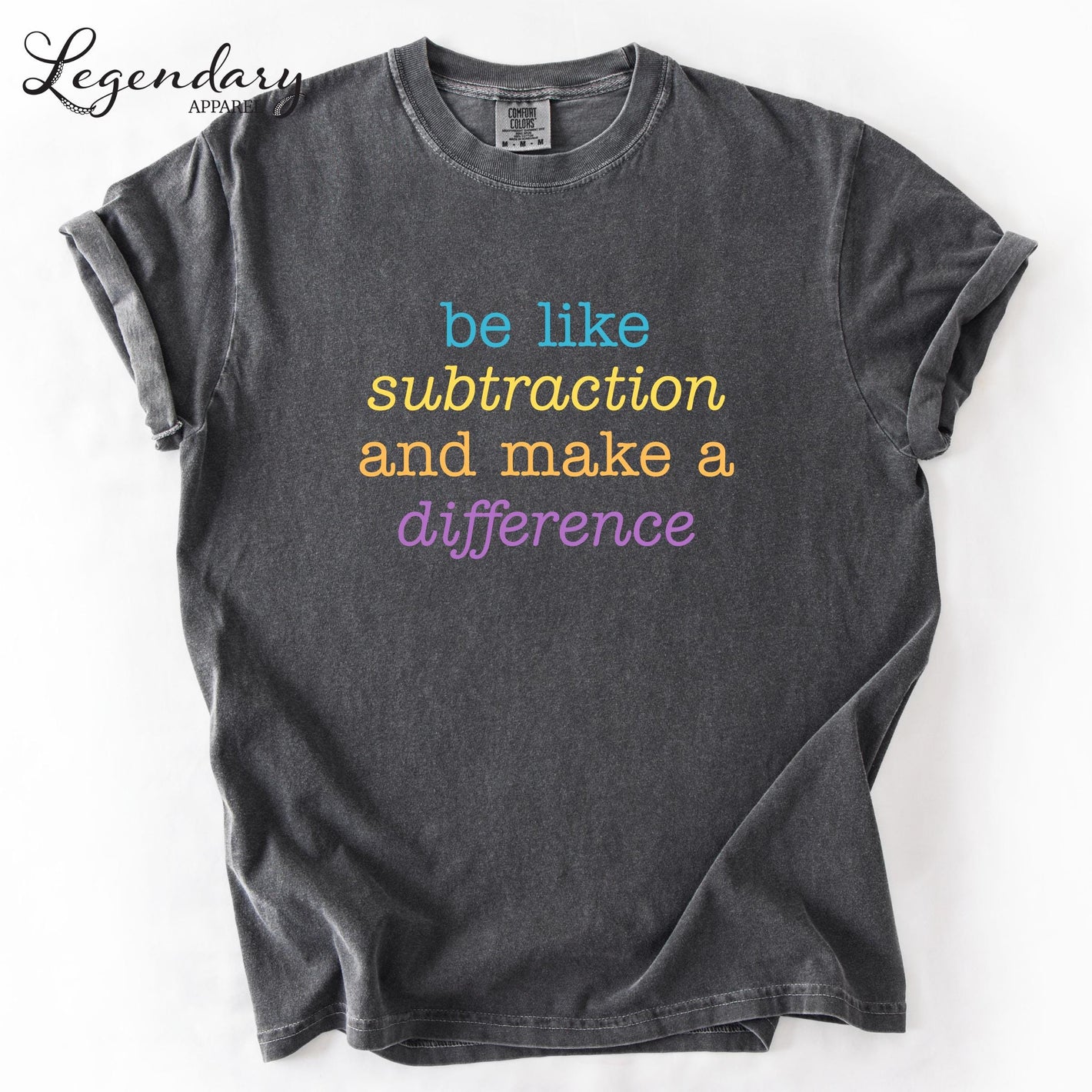 A gray t-shirt with a colorful text message printed on it.