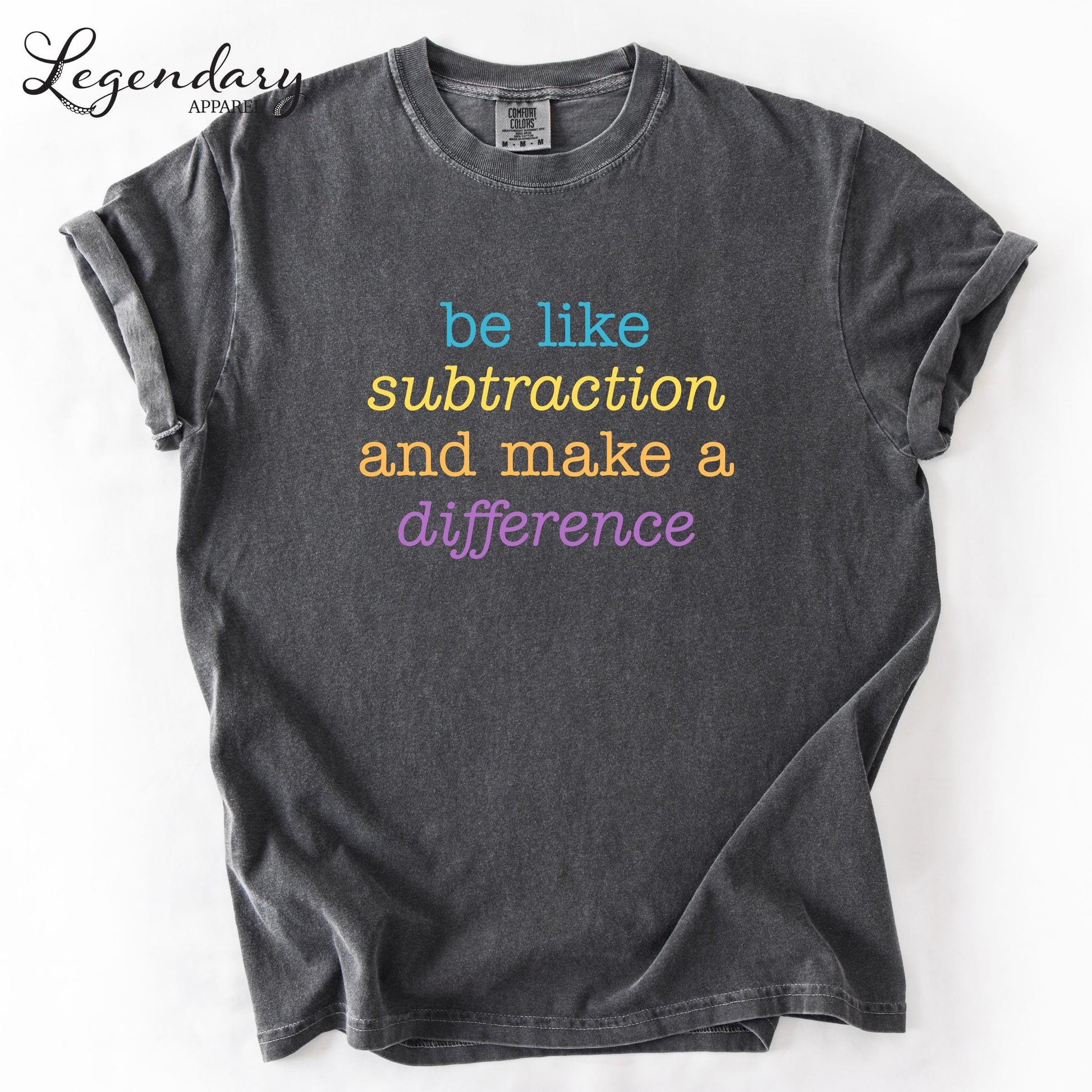 A gray t-shirt with a colorful text message printed on it.
