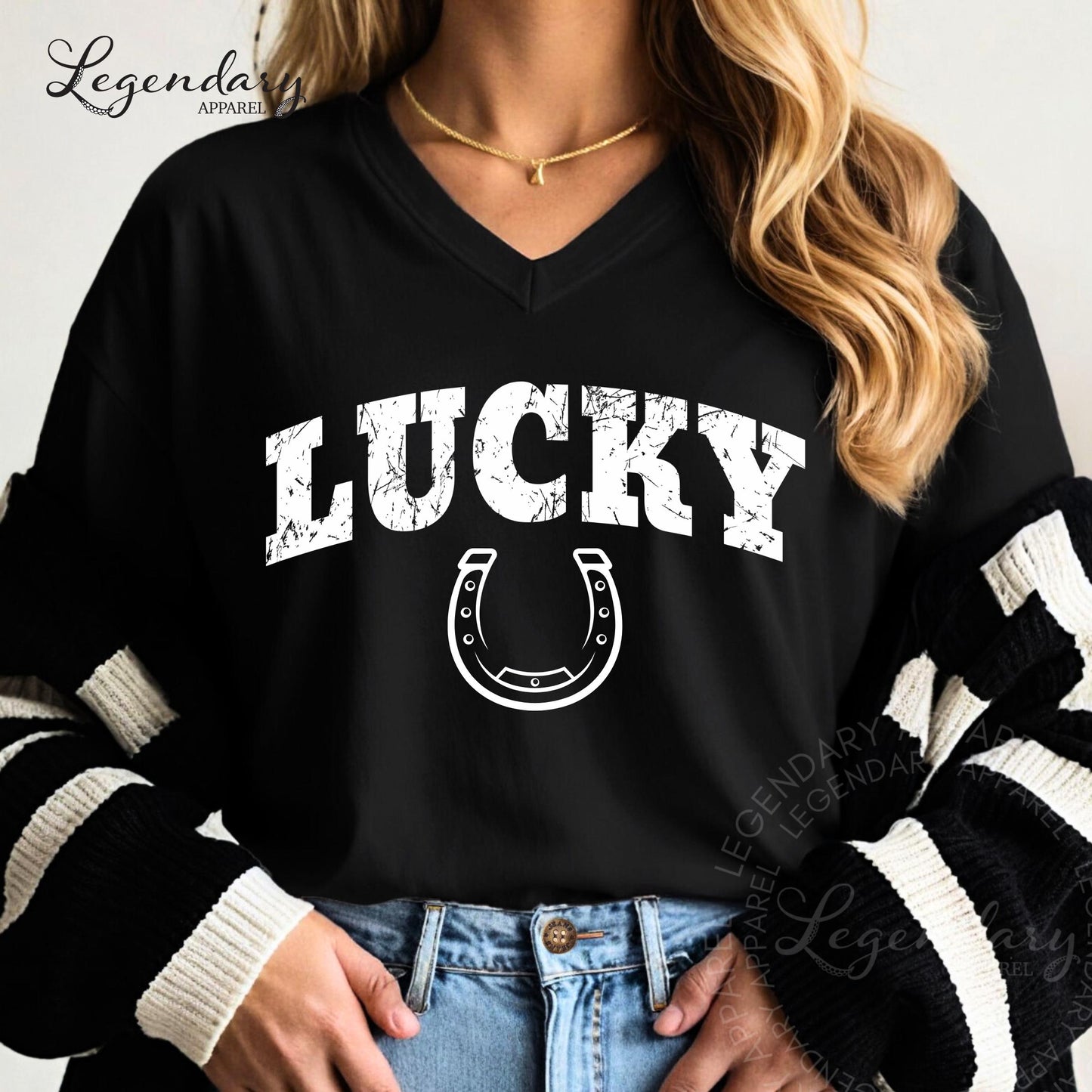 A woman wearing a black shirt with the word "Lucky" printed on it, along with a horseshoe graphic.