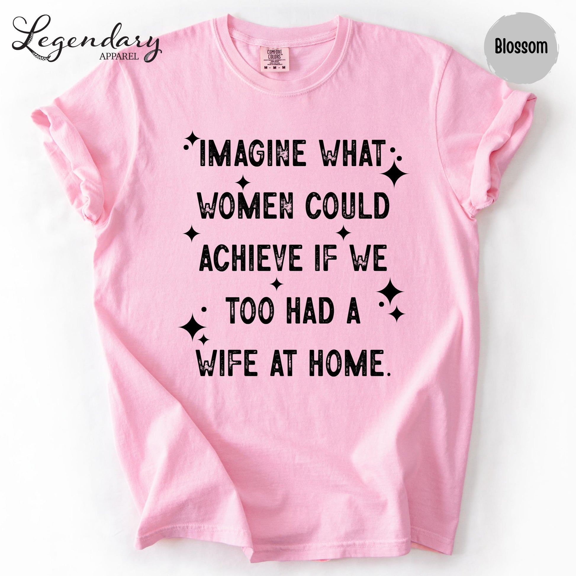 A pink t-shirt with a humorous text printed on it.