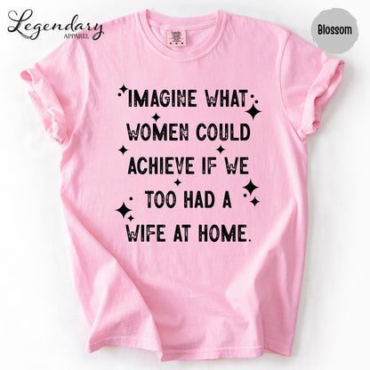 A pink t-shirt with a humorous text printed on it.