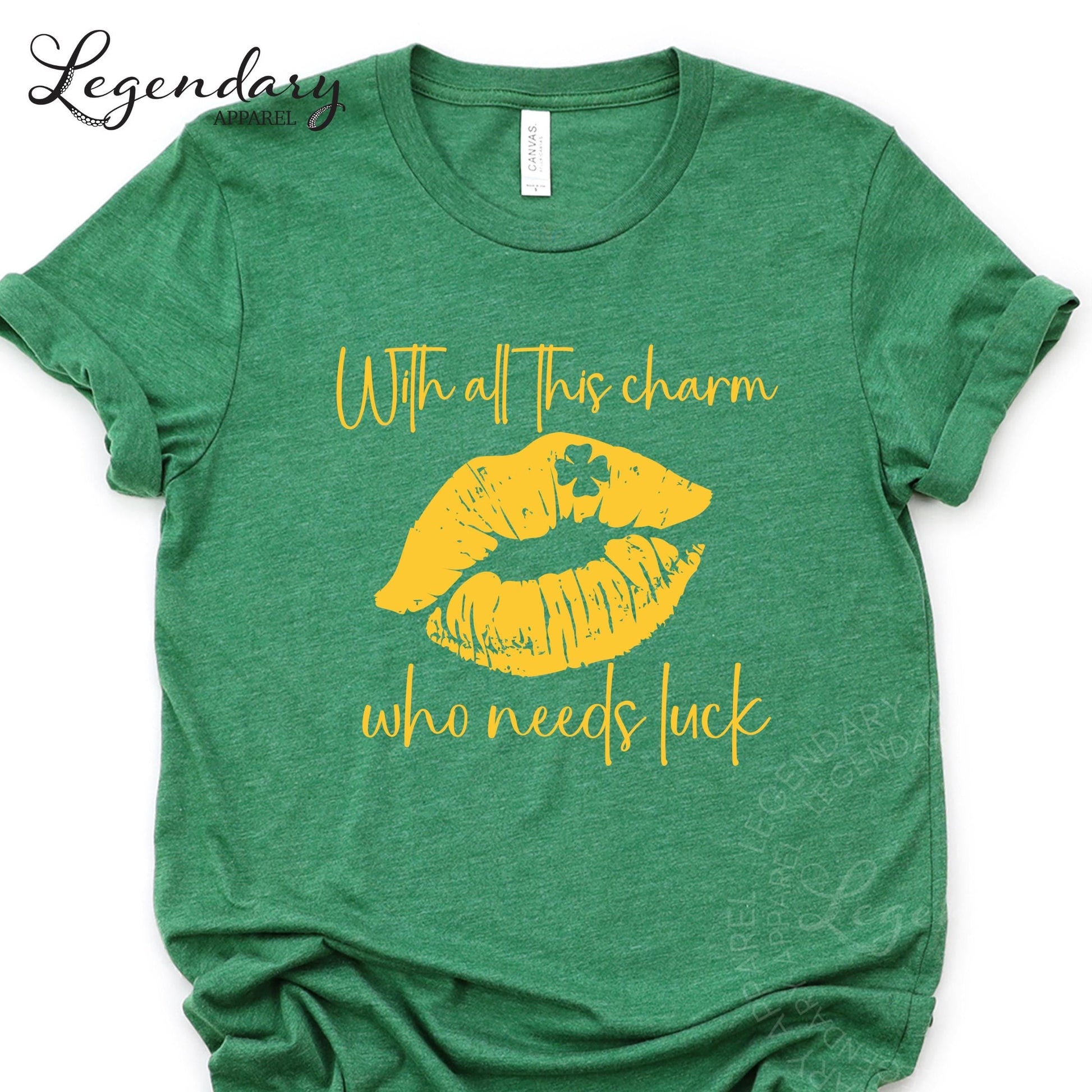 A green t-shirt with a yellow graphic design and text printed on it.