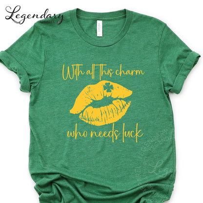 A green t-shirt with a yellow graphic design and text printed on it.