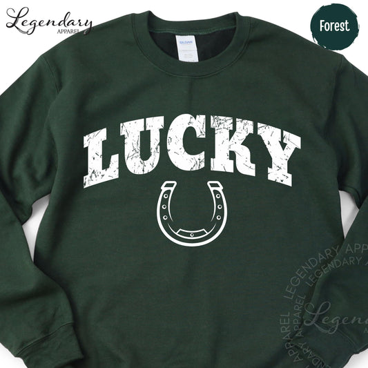 A green sweatshirt with the word "Lucky" printed on it, along with a horseshoe graphic.