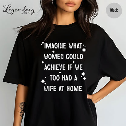 A woman wearing a black t-shirt with white text printed on it.
