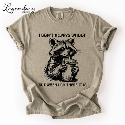 A t-shirt with a raccoon graphic and text that reads "I DON'T ALWAYS WHOOP BUT WHEN I DO THERE IT IS".
